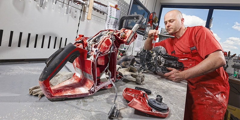Repair technician repairing a tool