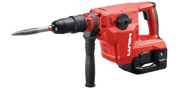 A red Hilti demolition tool with a pointed chisel bit is displayed. It features a side handle for stability and a battery compartment at the bottom, designed for heavy-duty construction work.
