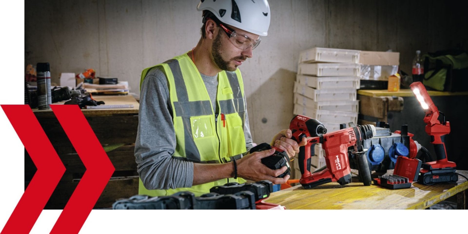 A craftsman takes a Nuron battery out of a SID 6-22