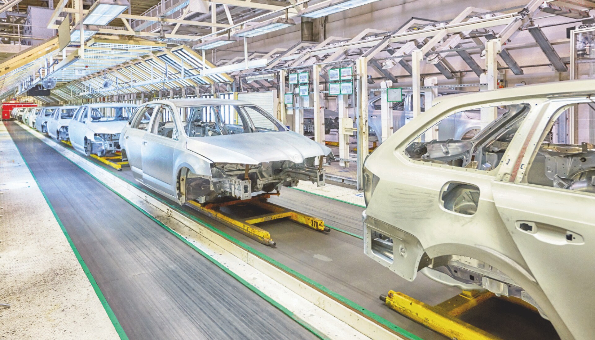 A production line of car chassis in an automotive plant