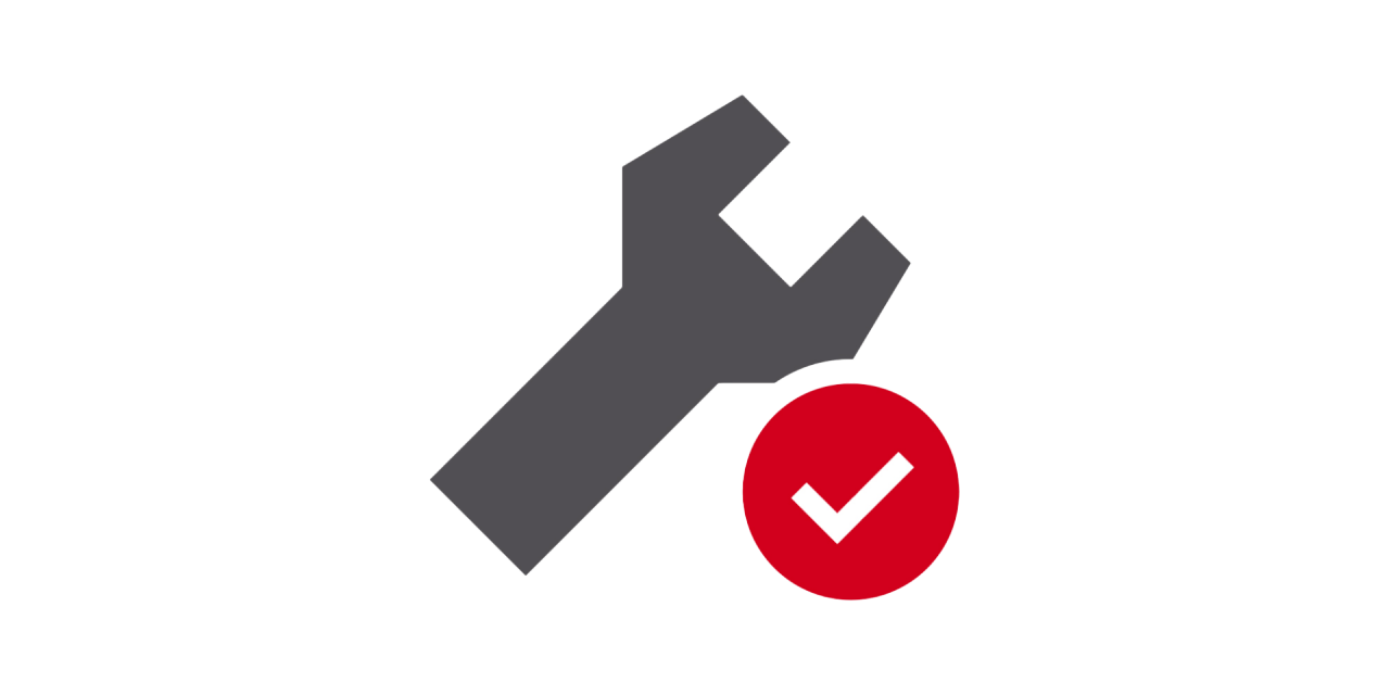 Spanner icon with a red tick inside is on display