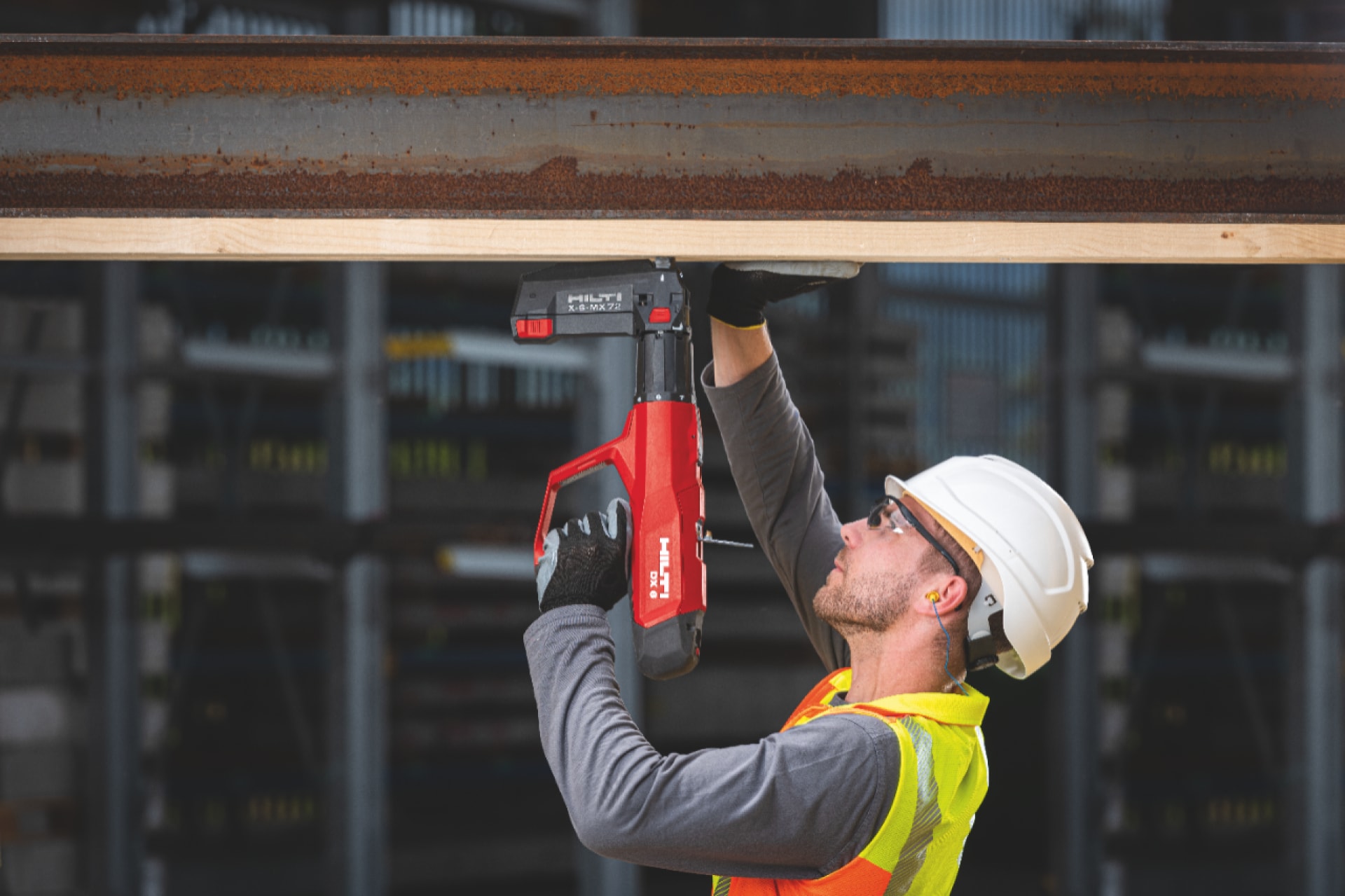 Worker using the Hilti DX 6 battery-operated direct fastener