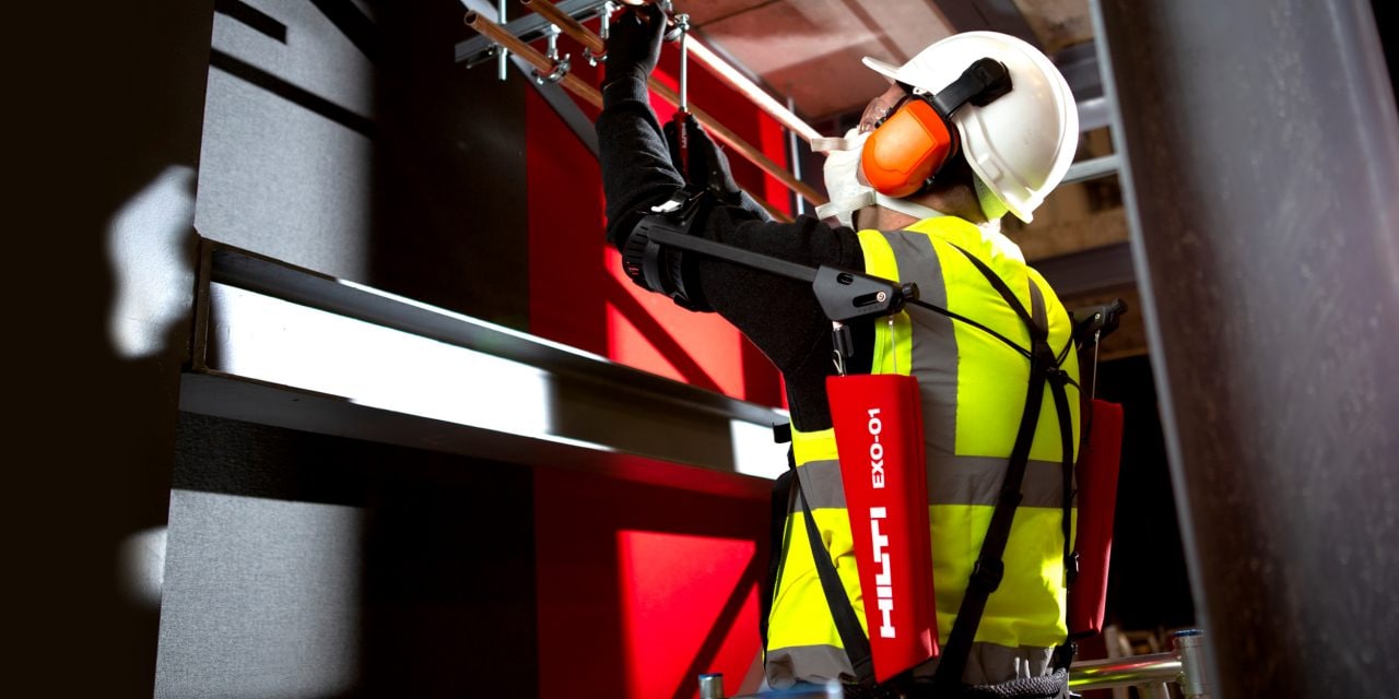 Man working overhead while using Hilti EXO-T shoulder support.