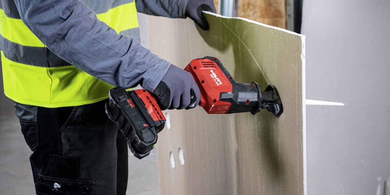 construction worker using Hilti tool