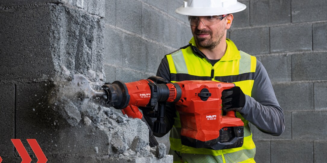 construction worker using Hilti tool