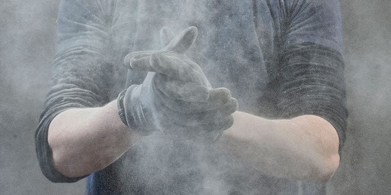 Close up of two dusty gloves.