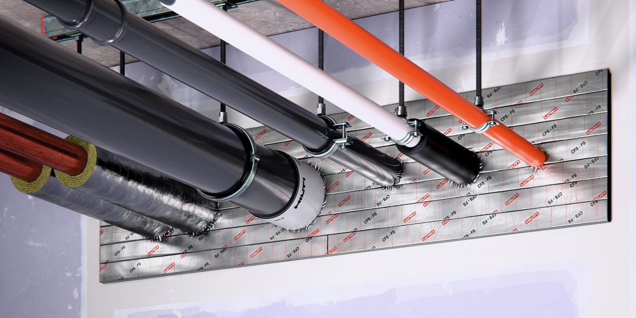 Hilti's stackable firestop foam strips are applied to a wall on the jobsite