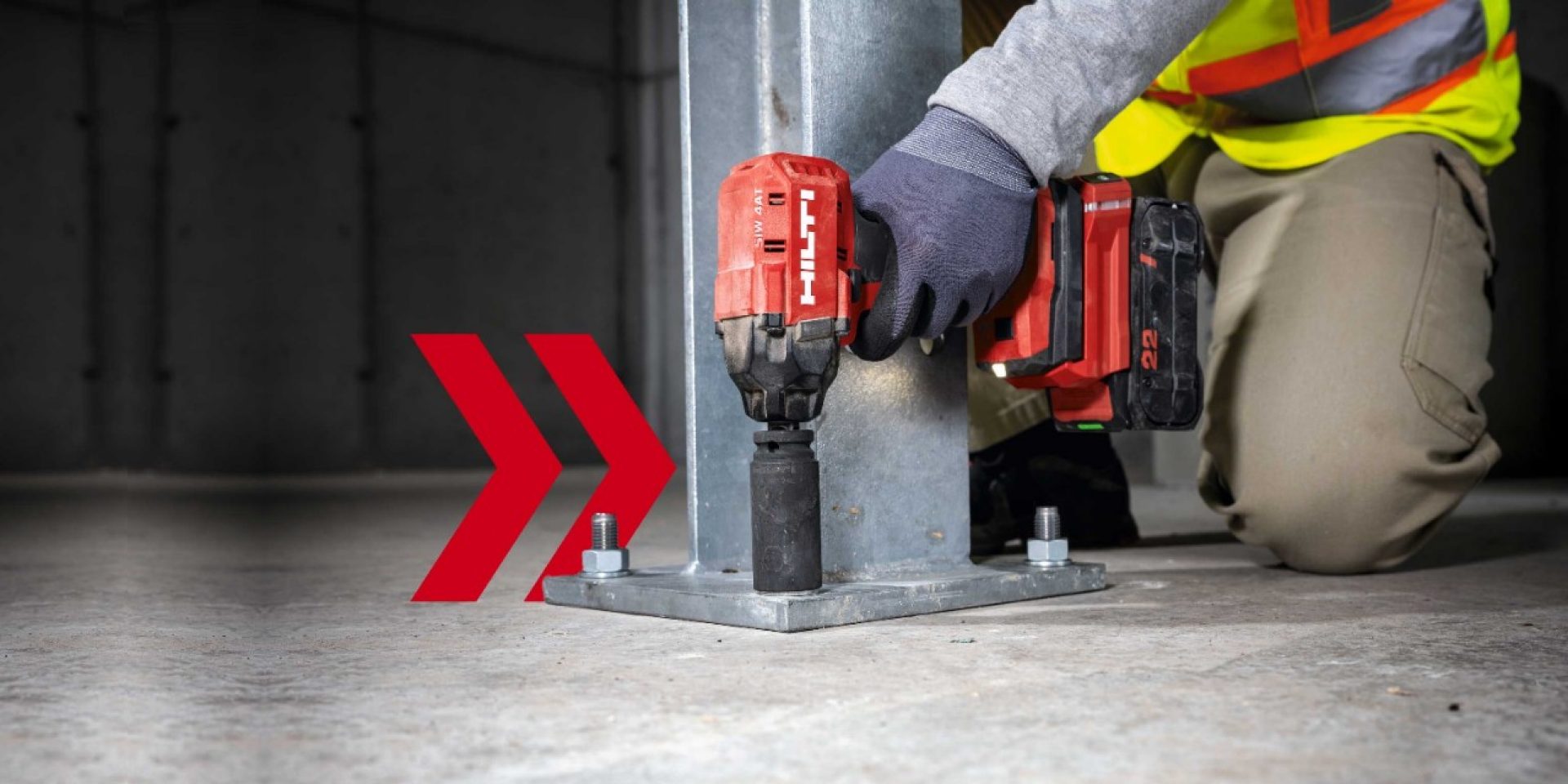 WORKER USING HILTI NURON IMPACT WRENCH