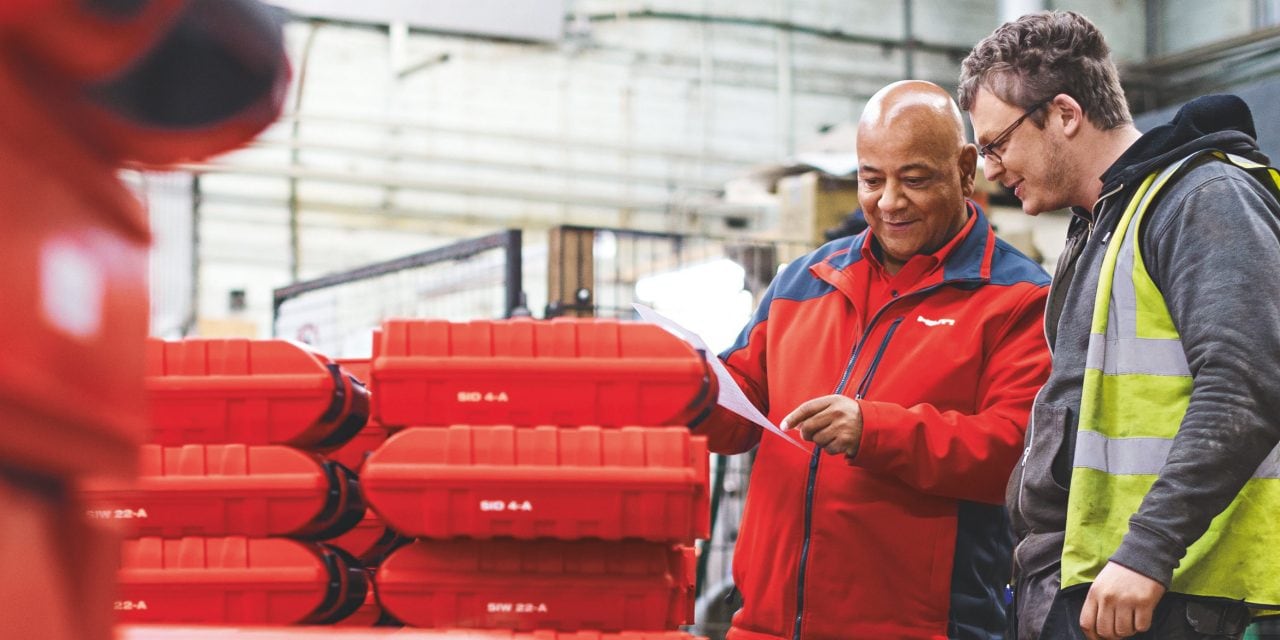Hilti Account manager discussing wit customer Hilti tools delivery.